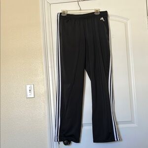 Adidas Black Track Pants with Iconic Stripes